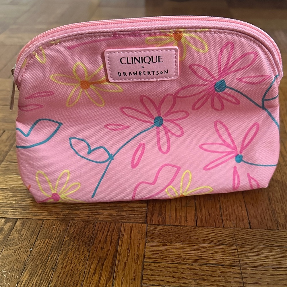 CLINIQUE x Drawbertson pink floral cosmetic bag